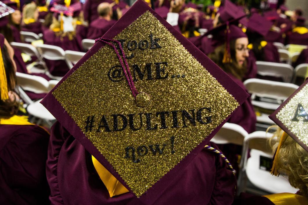 A graduation cap reads, 