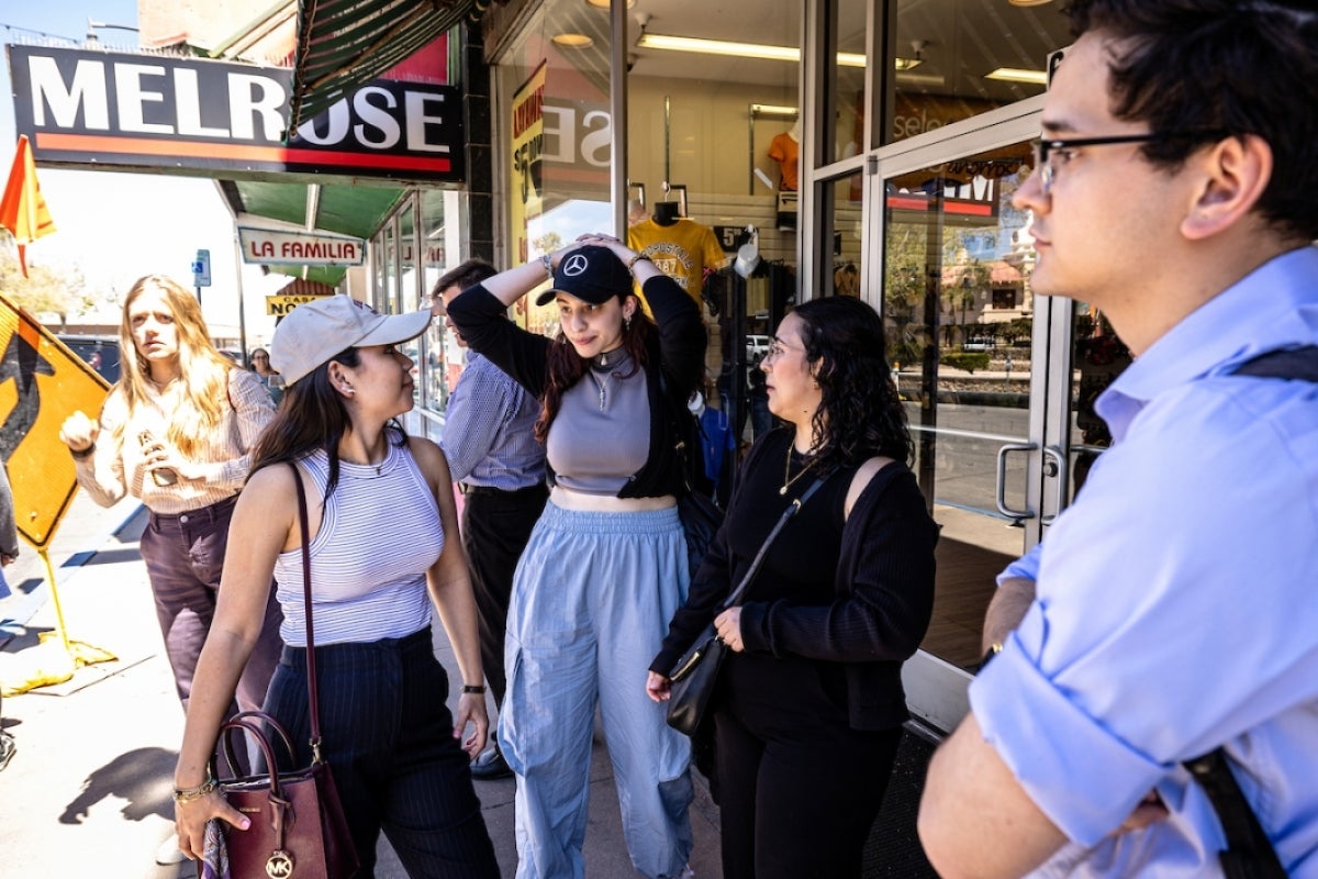 Standing outside of a store