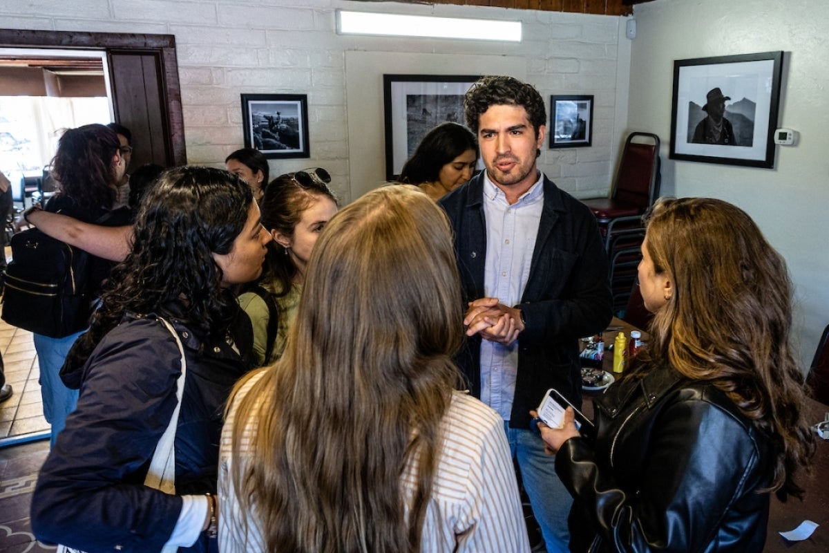 Man speaking to students