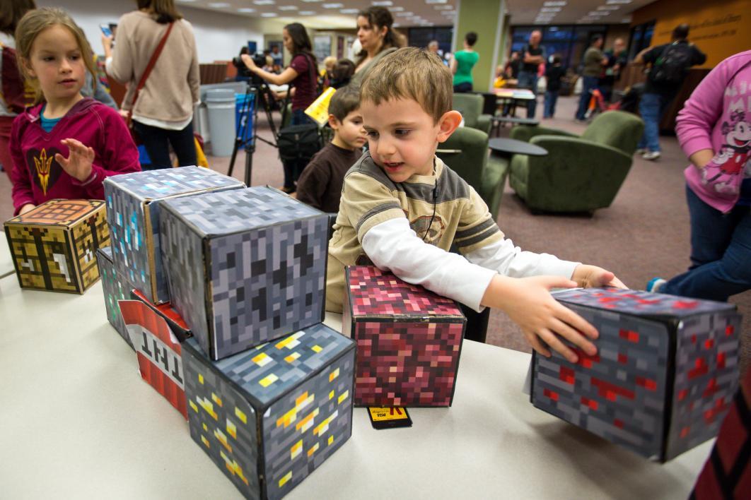 kid playing with blocks