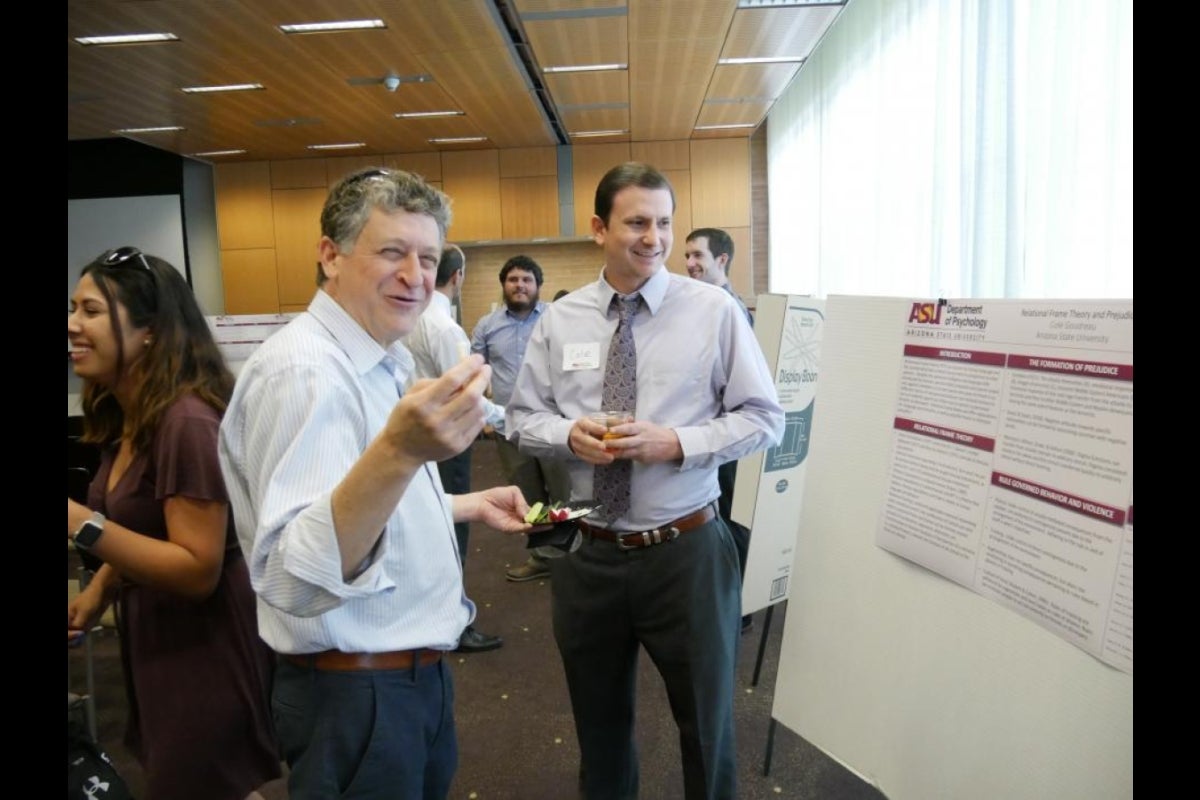 Steve Neuberg listens to research findings