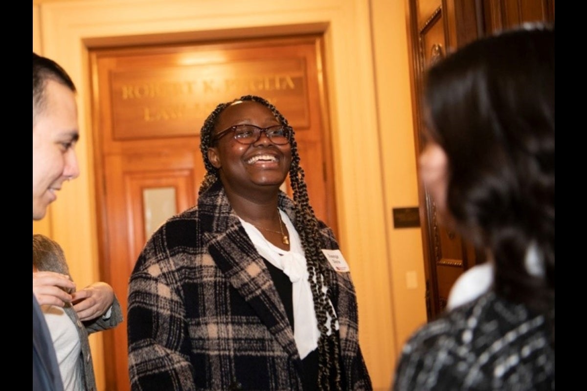 Group of students smiling and talking