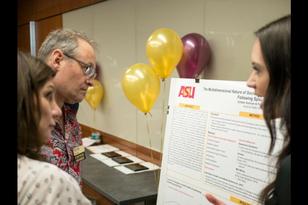 Colleen Sullivan presents to Dr. Neil Farber