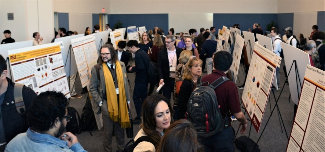 Aerial shot of attendees at the College of Health Solutions Faculty Research Day.