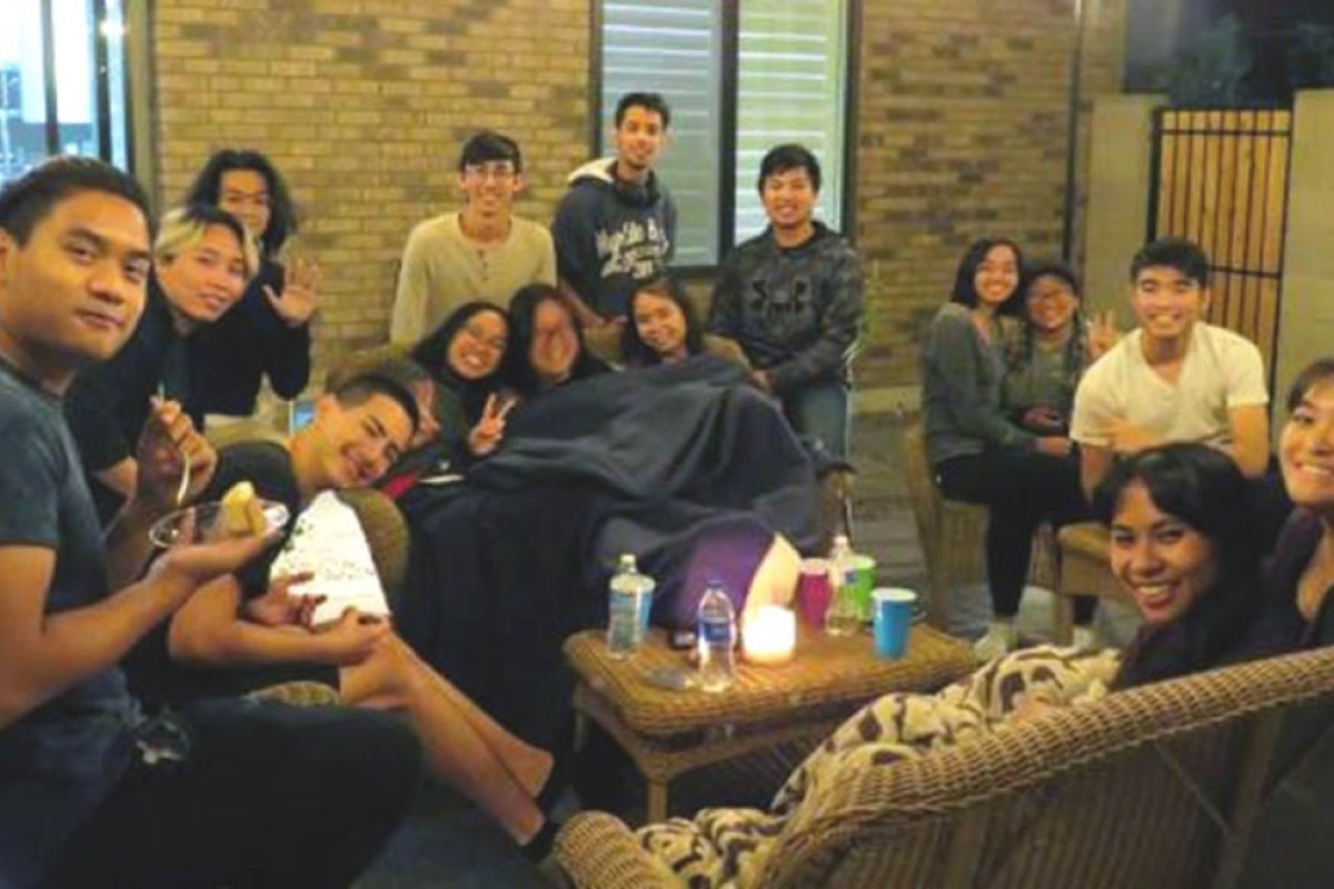 Students sitting around coffee table