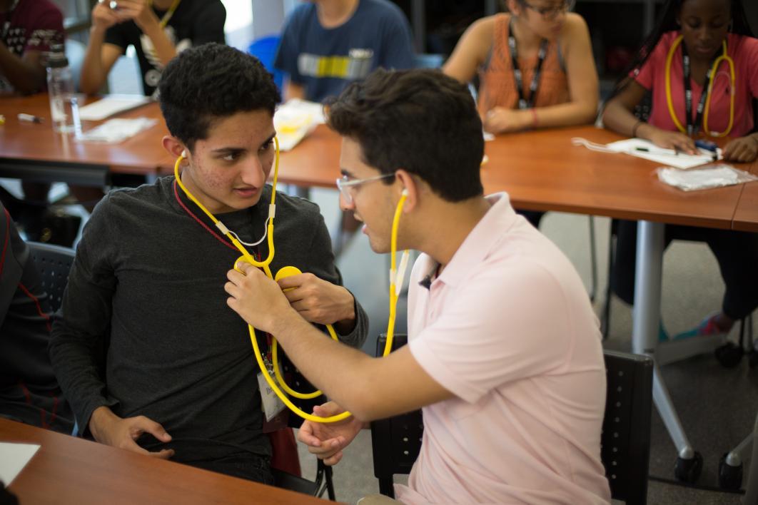 student uses stethoscope