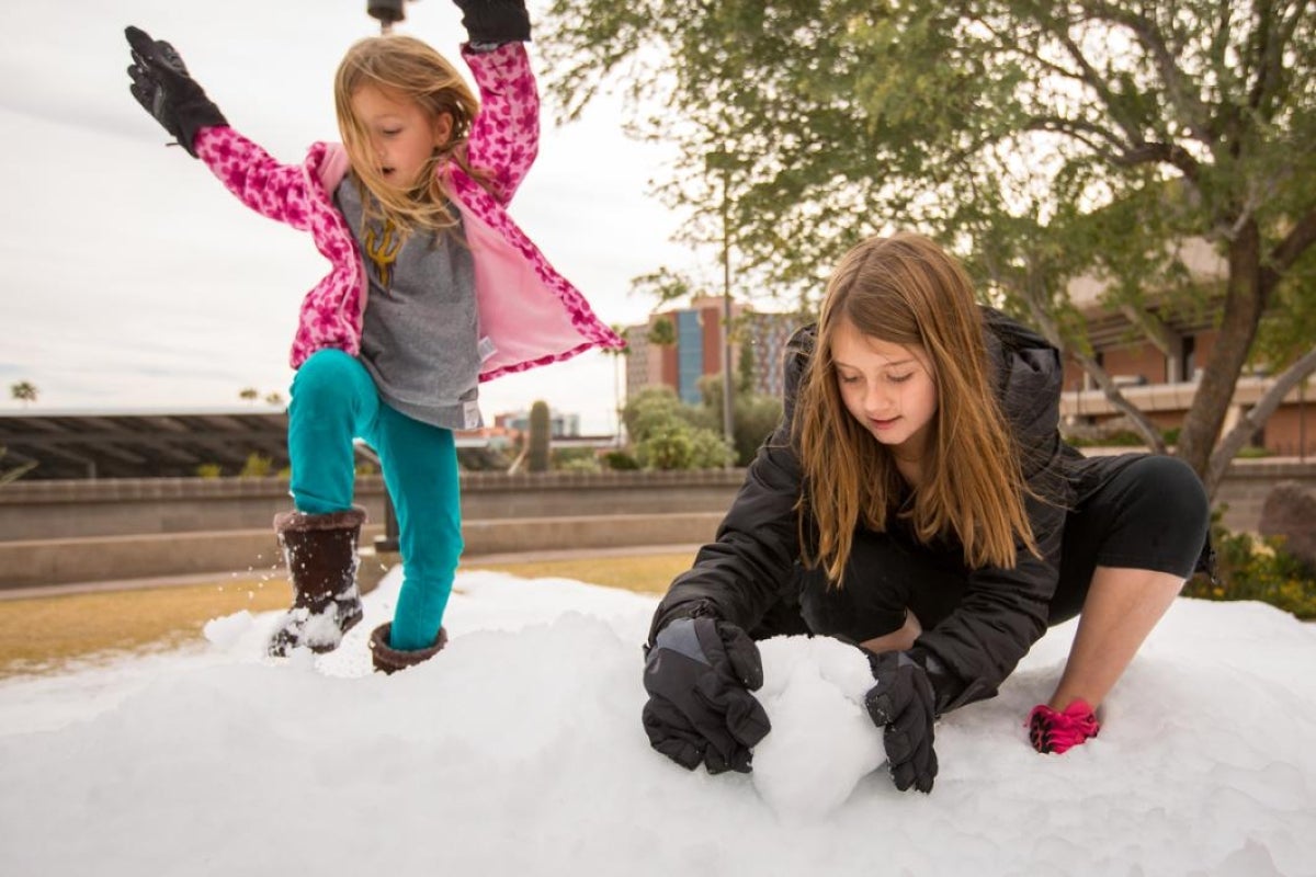 Children playing in the snow.