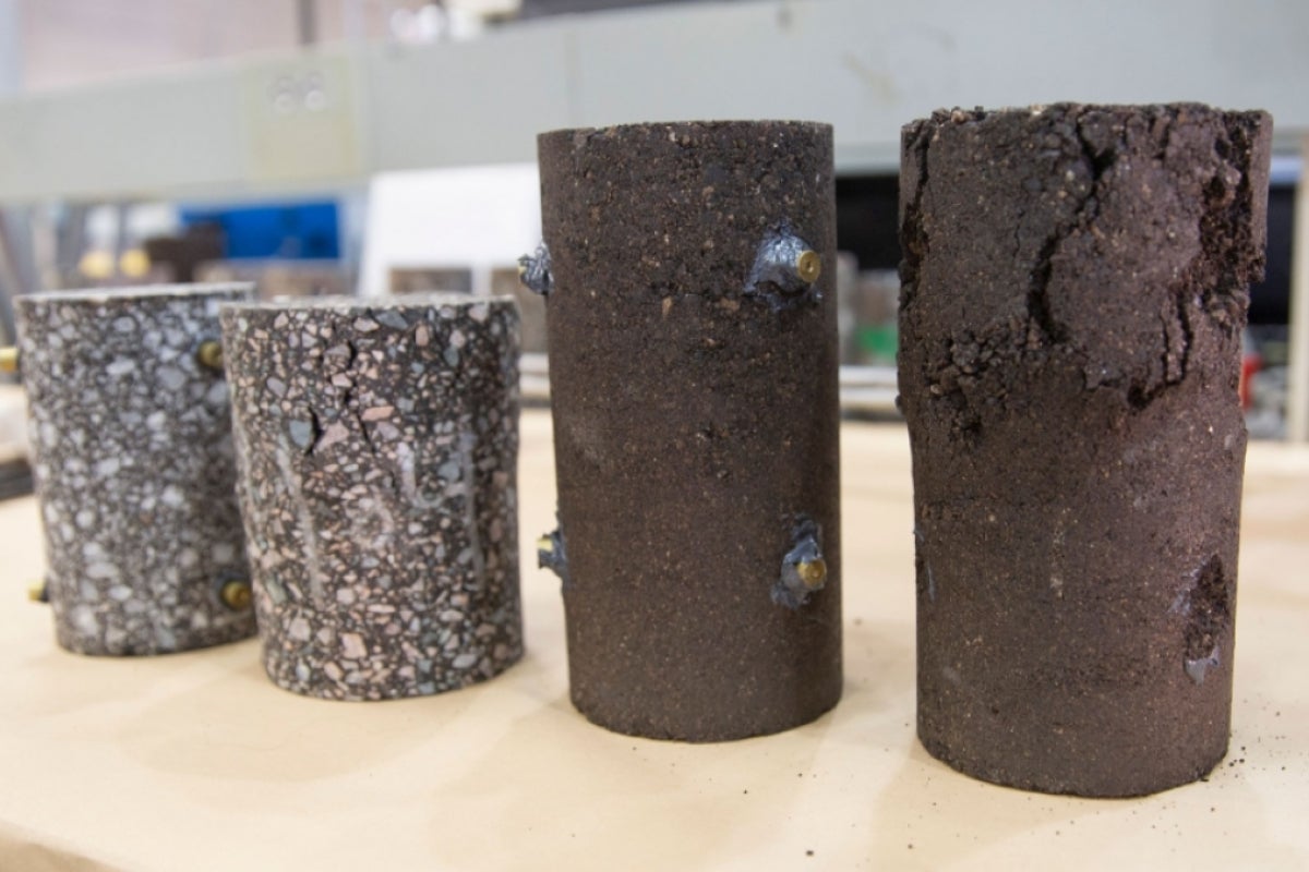 Pavement samples before and after testing in the dynamic triaxial testing system.