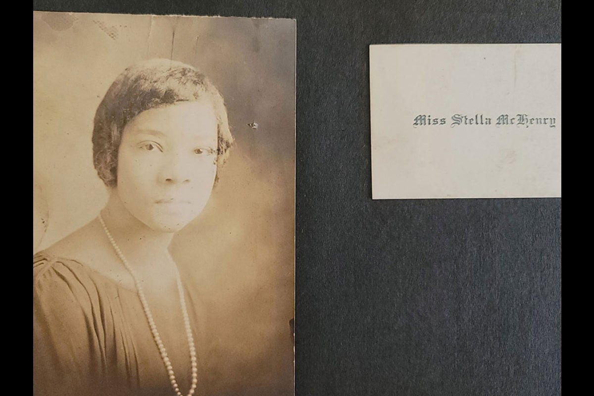 scrapbook with sepia photo of woman and her name