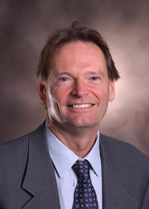 A portrait photo of ASU scientist Stephen Albert Johnston