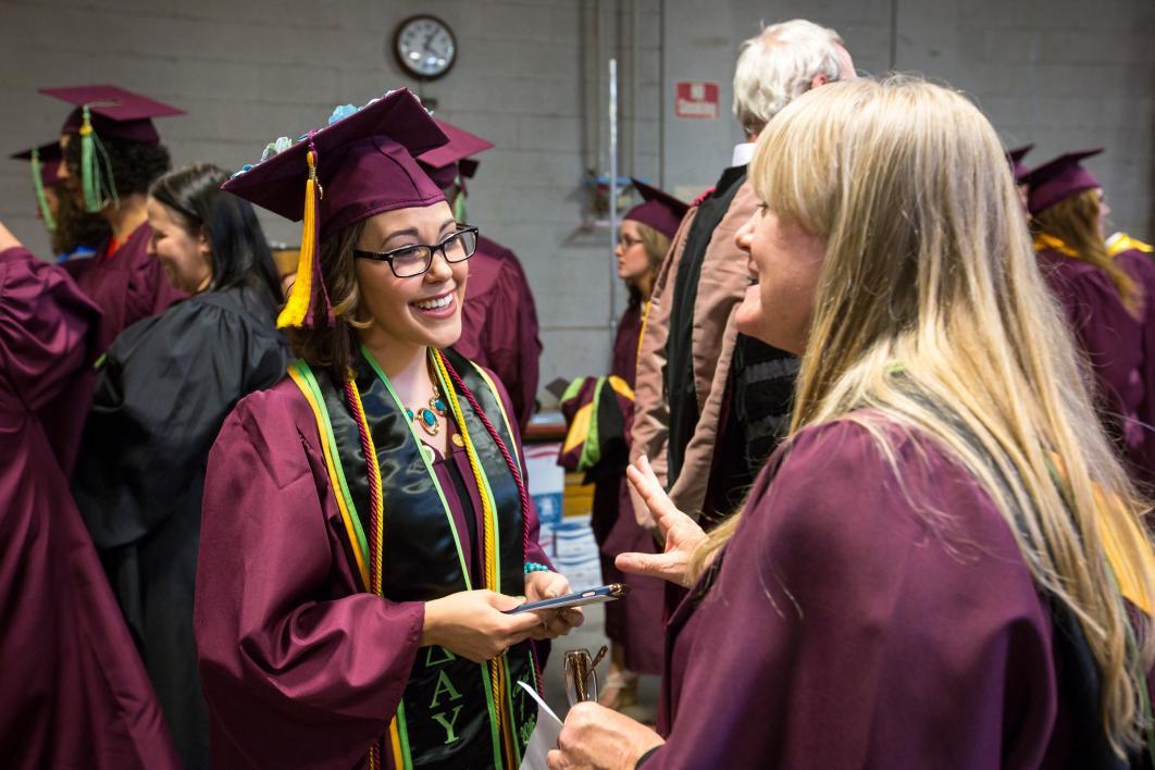 two people talking before convocation