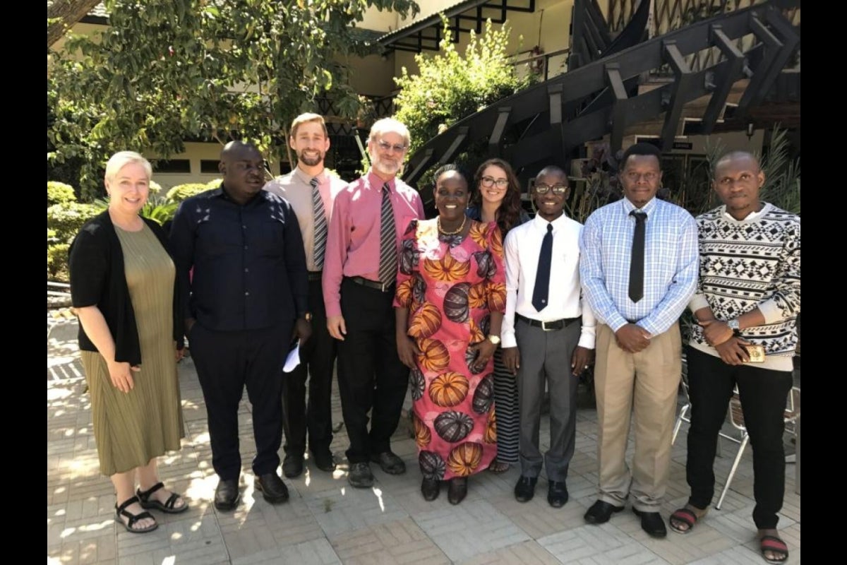 A group of educators pose for a photo in Tanzania