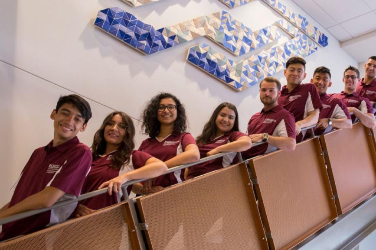 Ava Karanjia (third from left) poses with other Tooker House residential hall peer mentors. In this role she helps first-year students be successful and discover opportunities to explore their interests.