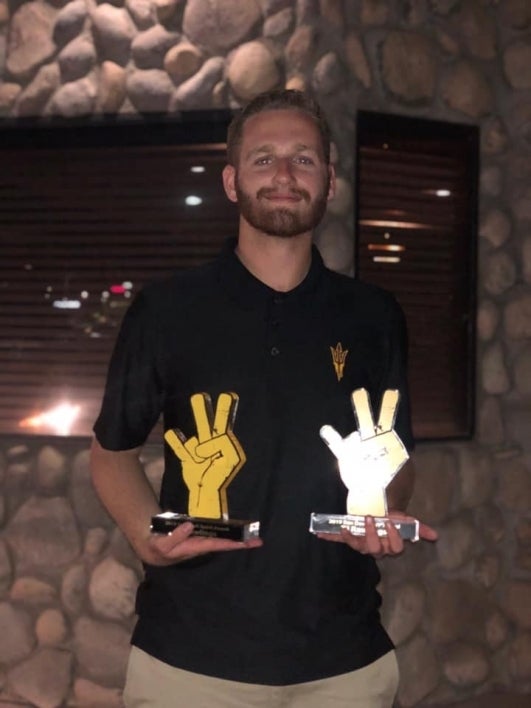 ASU@Lake Havasu student, TJ Cook displays his Pitchfork Awards.