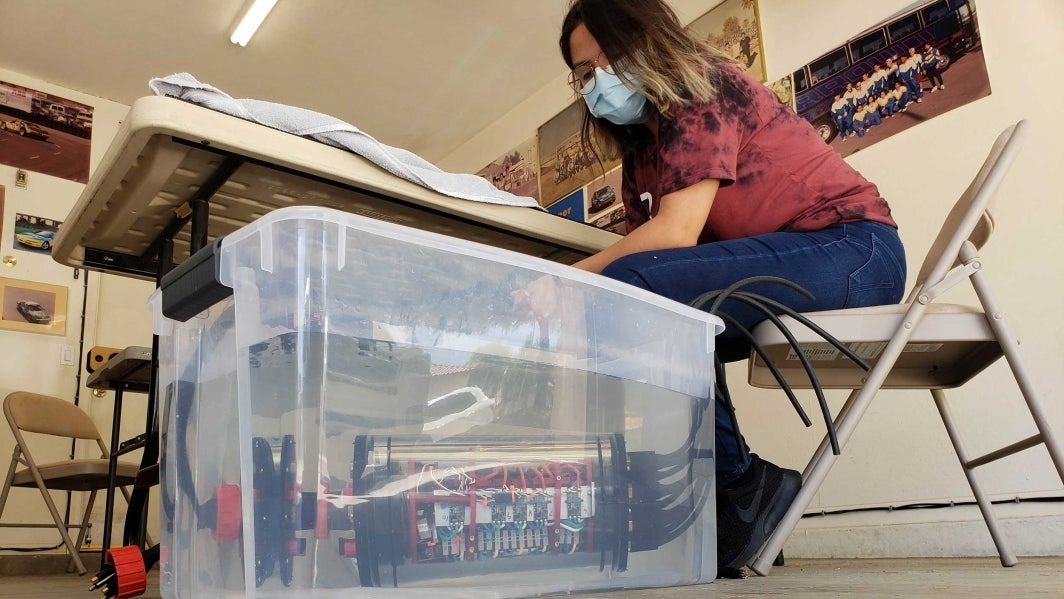 Paulina Garibay Jaquez of the programming team, testing the thruster hall.