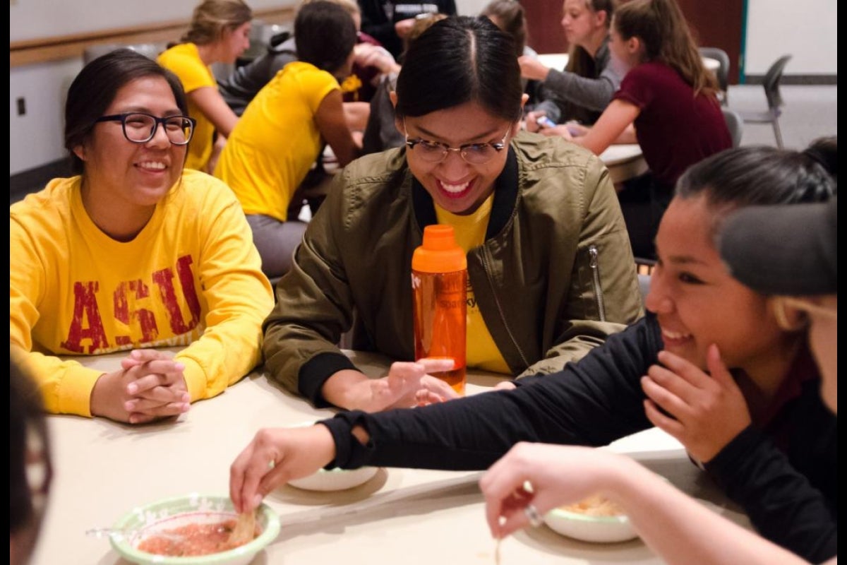 Students laugh at lunch