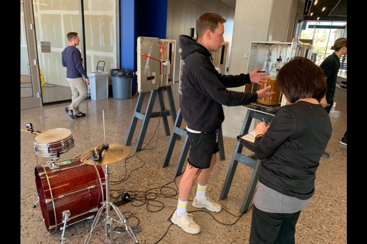 Man showing fermentation and drum kit display