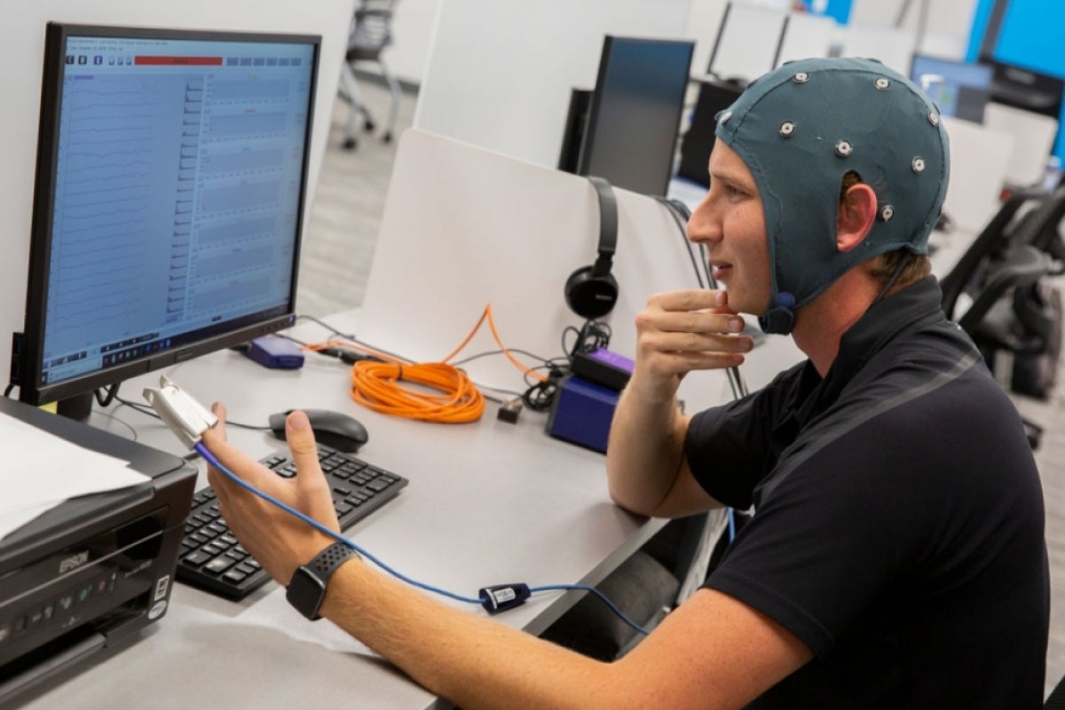 Nick Hool demonstrates the clinical study Hoolest uses to gather data about the investigational noninvasive vagus nerve stimulation device.