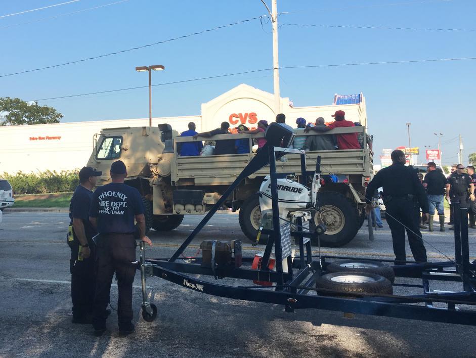 Wharton, Texas Hurricane Harvey victims in National Guard truck