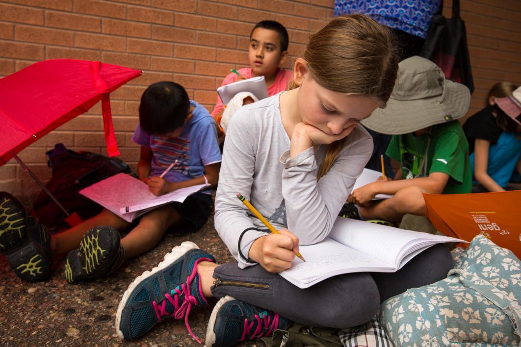 Students in ASU's youth writing program participate in a 