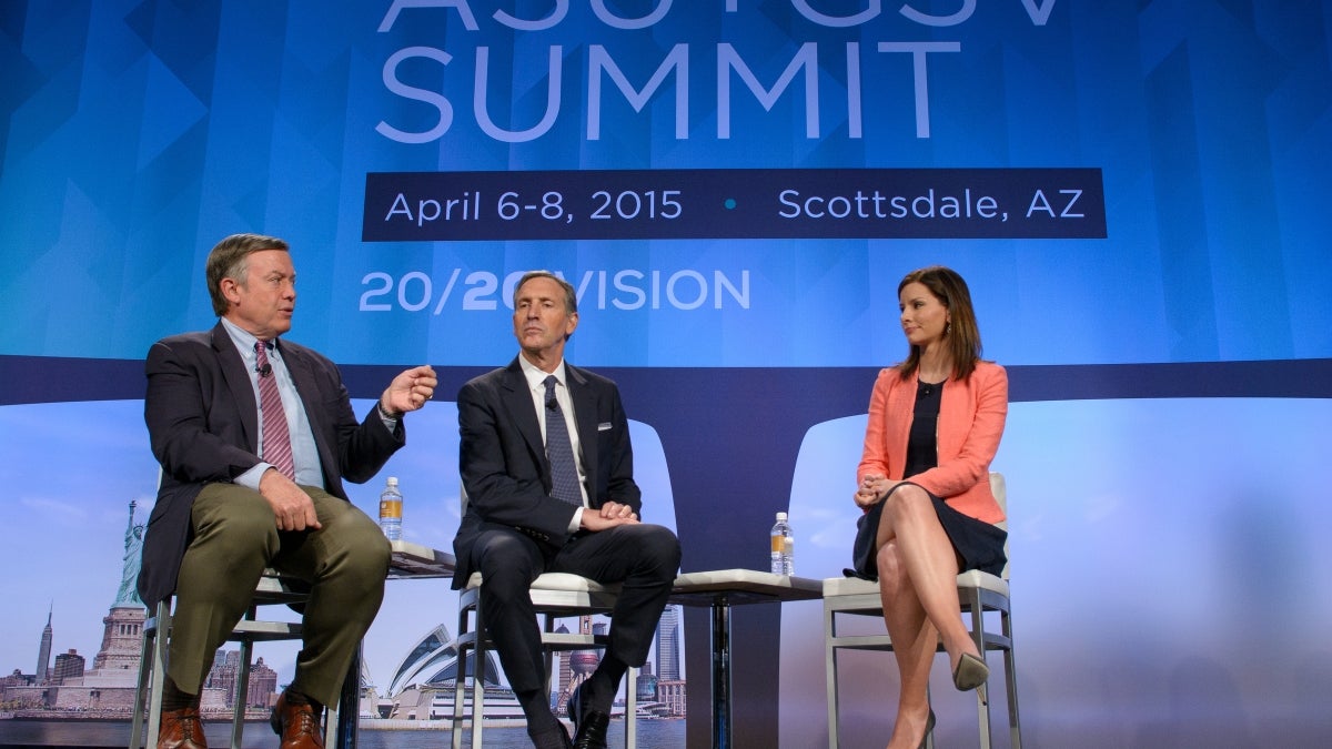 three people on stage talking to crowd at ASU+GSV Summit