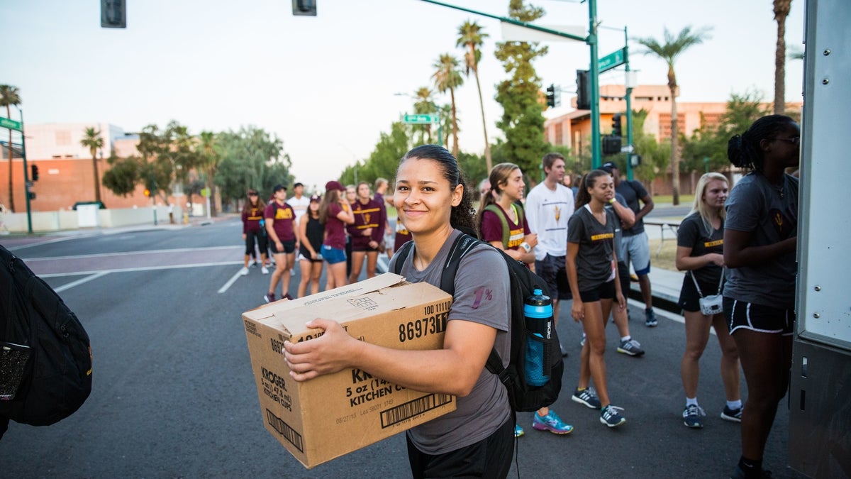 Woman holding a box