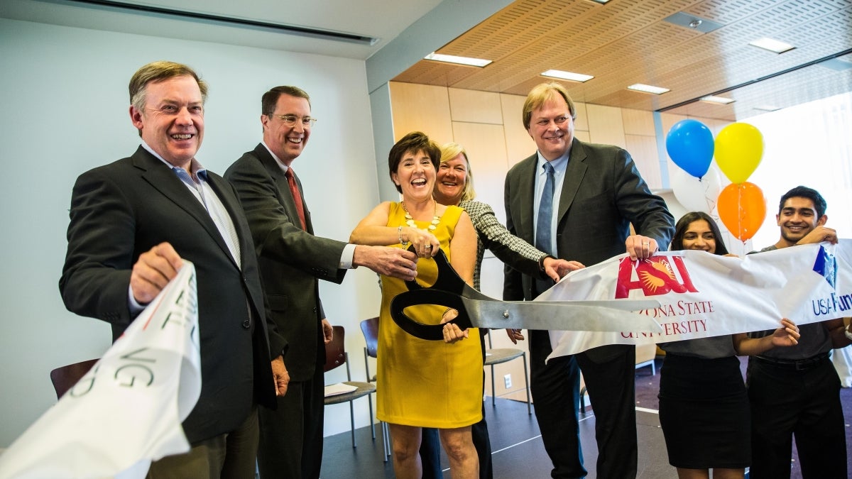 A ribbon-cutting at the PayPal-ASU partnership reception.