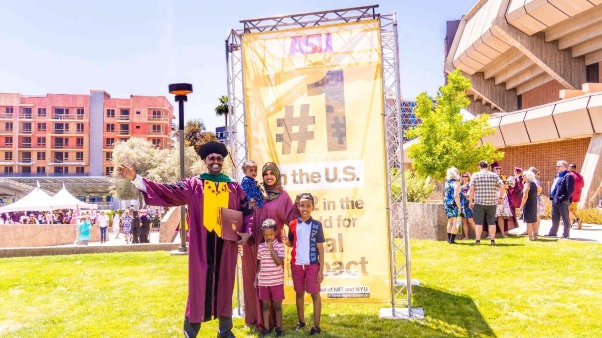 Towfik Elmi with his family at ASU convocation