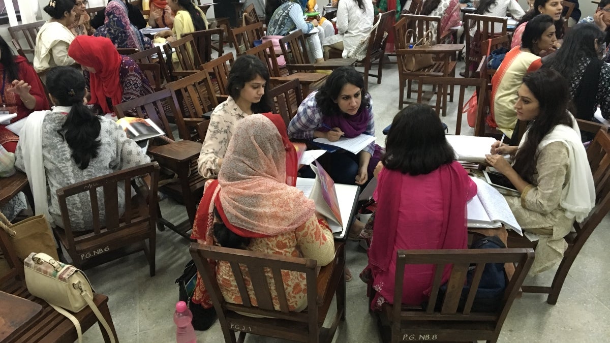 women learning in a classroom