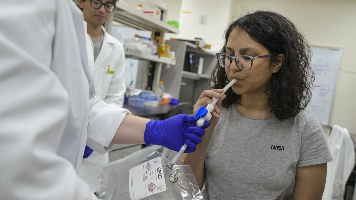 School of Life Science assistant professor Heather Bean test breath samples