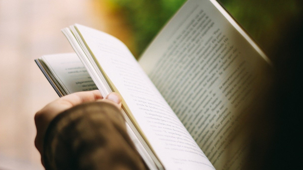 person reading book