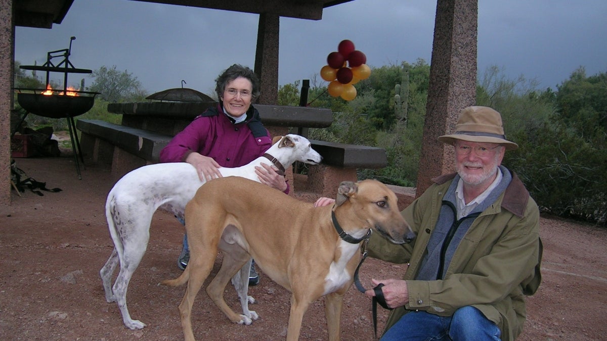 Ana and Tom Moore with their dogs.