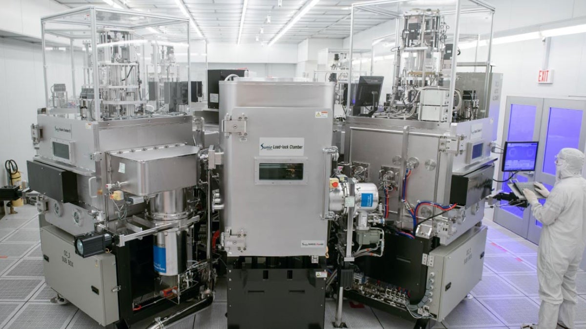 man working in clean room lab