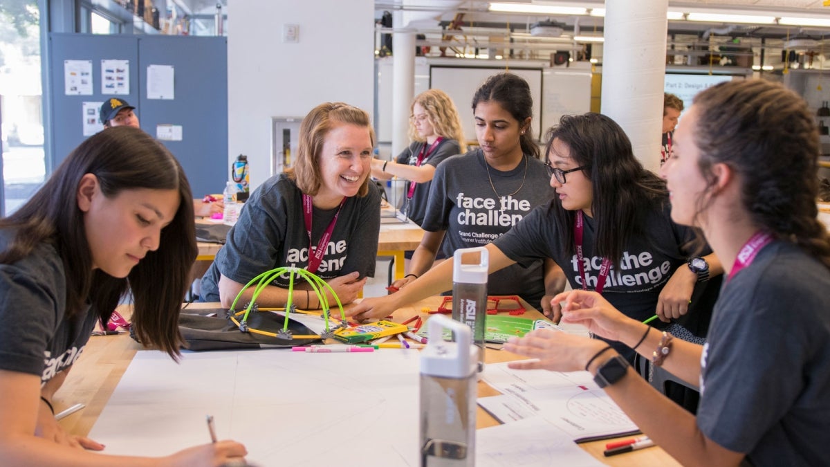 Amy Trowbridge (second from left) works with Grand Challenge Scholars Program students.