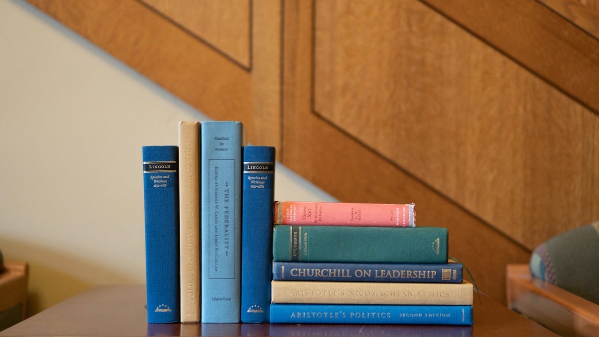 Stack of books on a table.