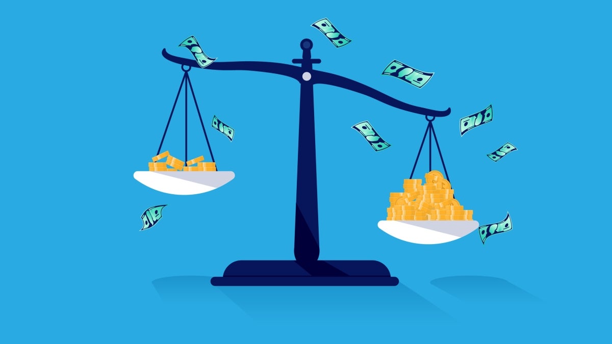 Illustration of scales with unequal amounts of money.