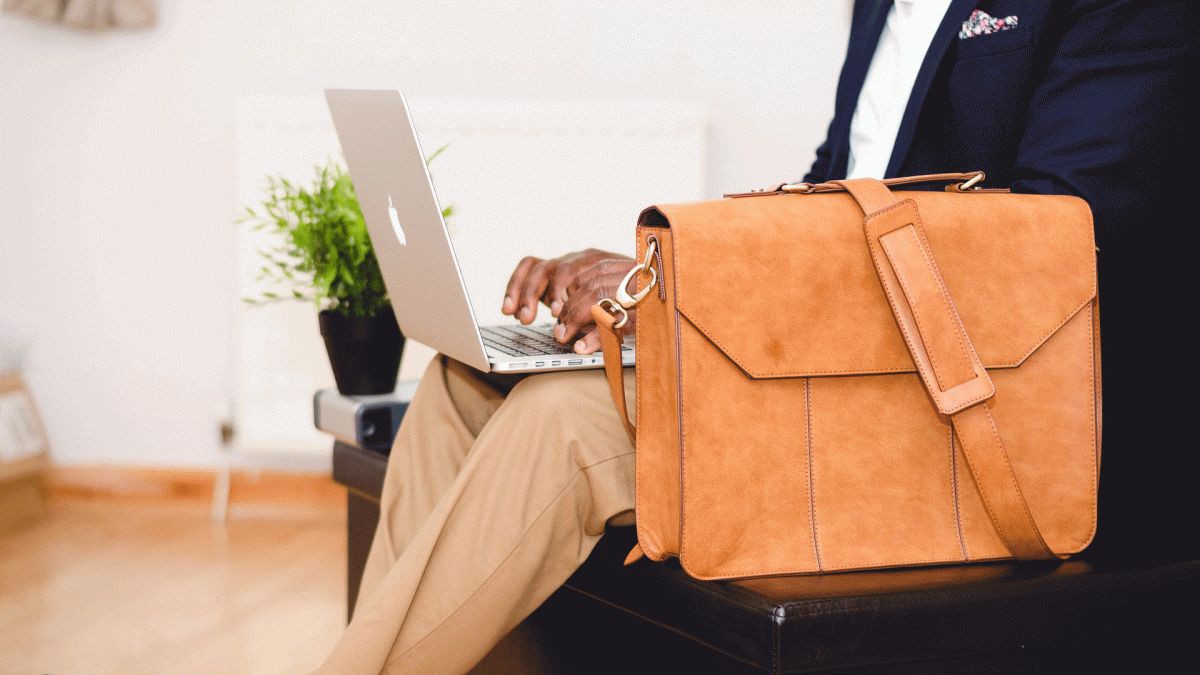 Man typing on laptop