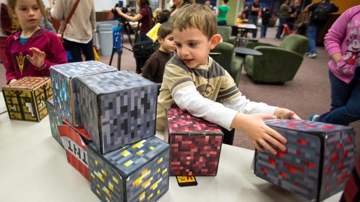 kid playing with blocks