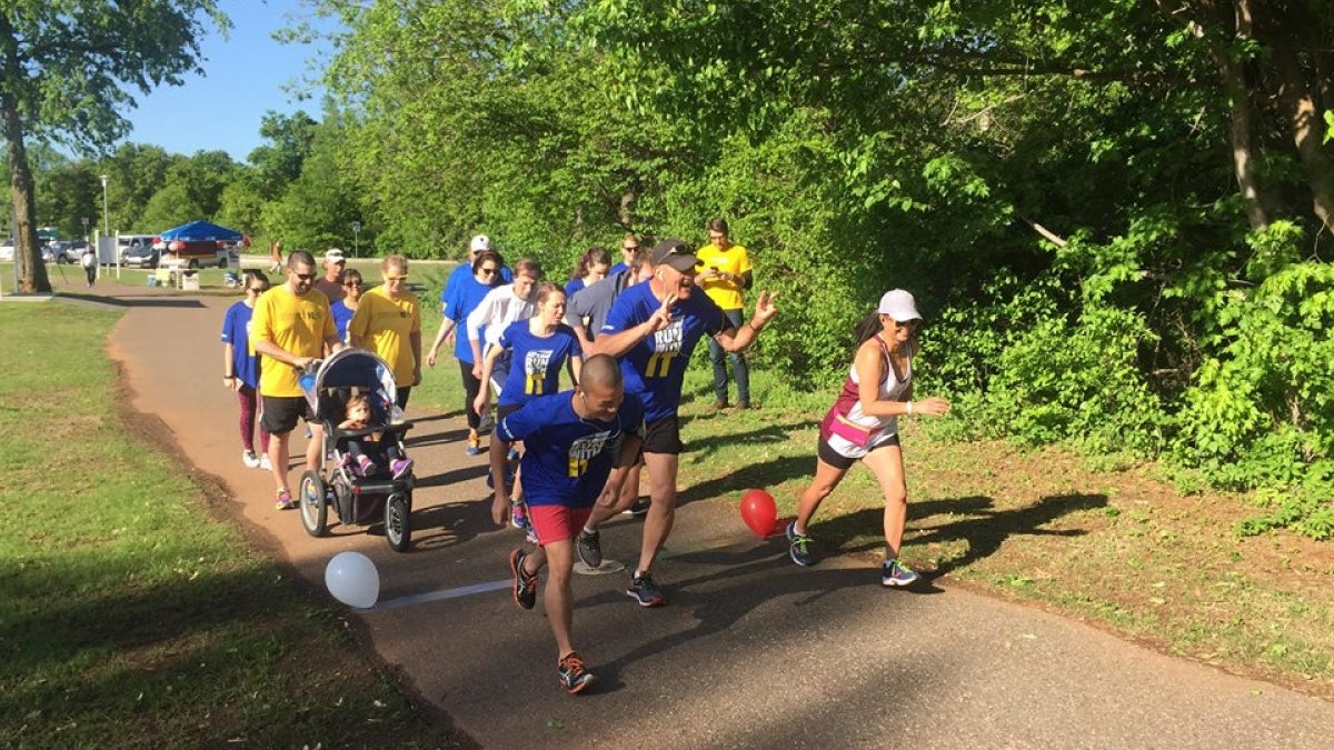 participants running in Pat&#039;s Run Shadow Run in Oklahaoma