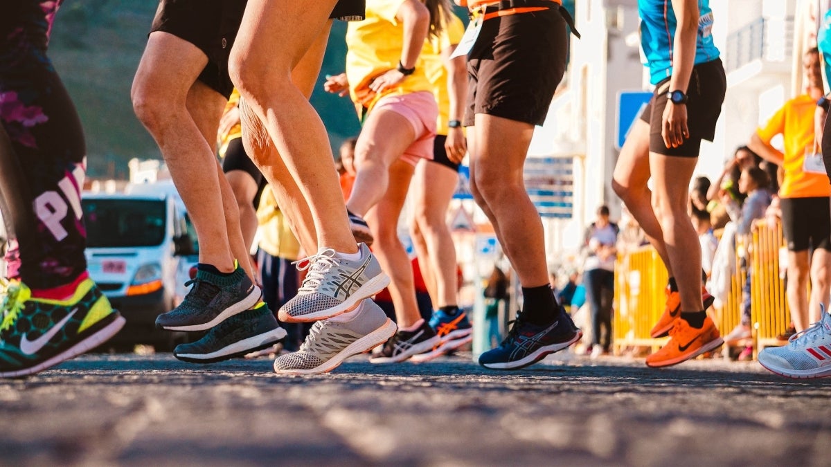 Feet of racers wearing sneakers