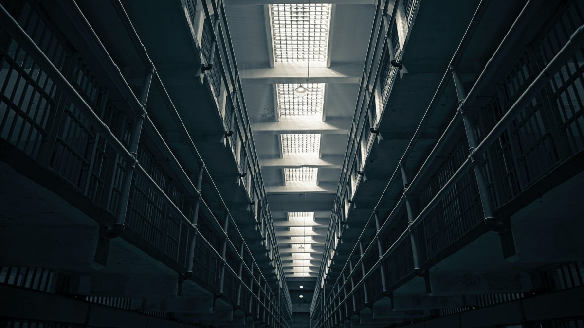 Rows of prison cells.