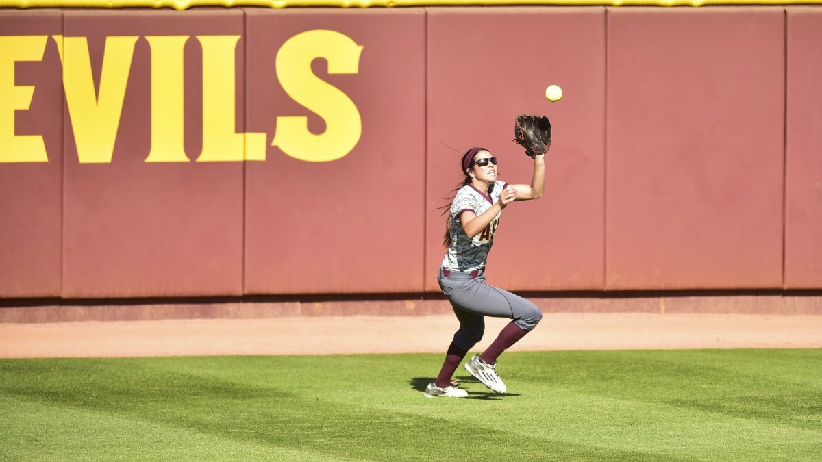 woman playing softball