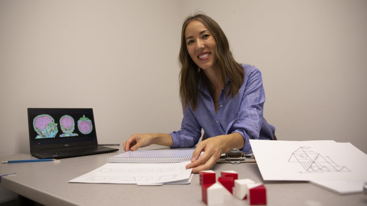 Sydney Schaefer shows a paper-and-pencil test that can help older adults have more successful physical therapy.