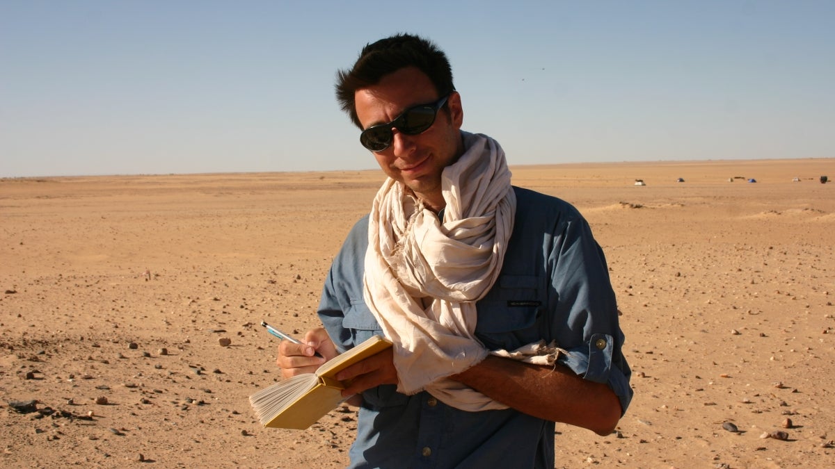 photo of Professor Christopher Stojanowski doing field research