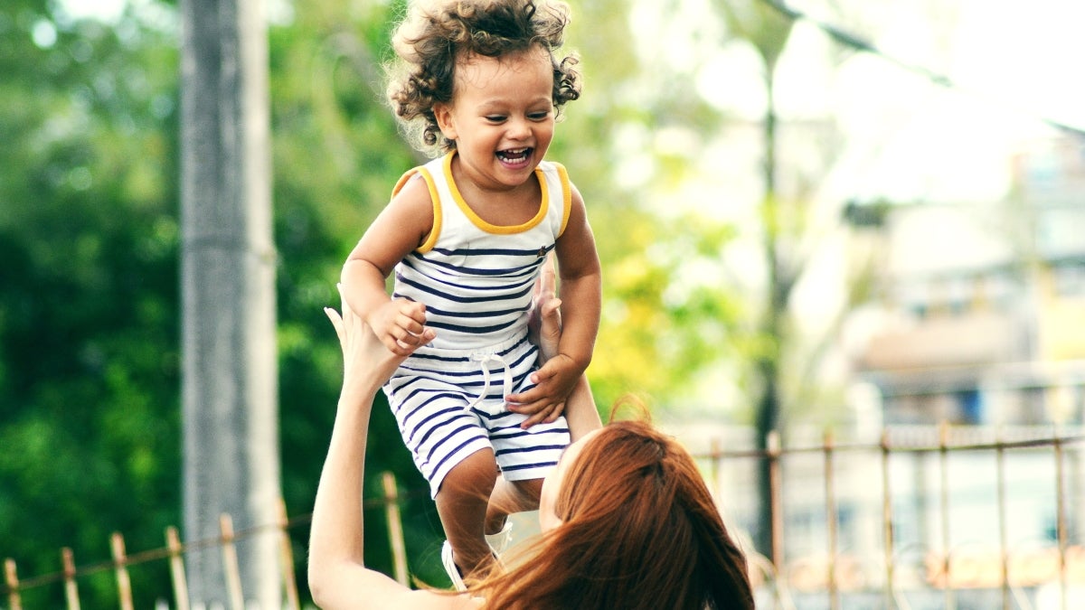 Mom playing with child