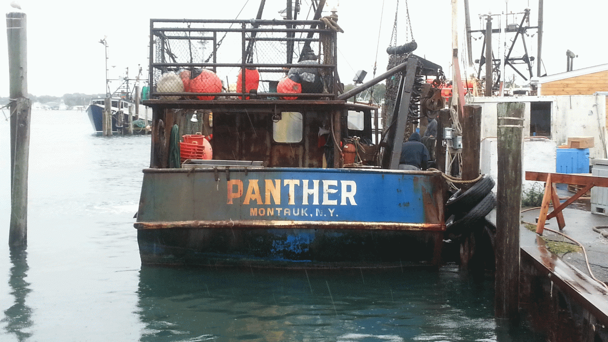 Fishing boat in the rain