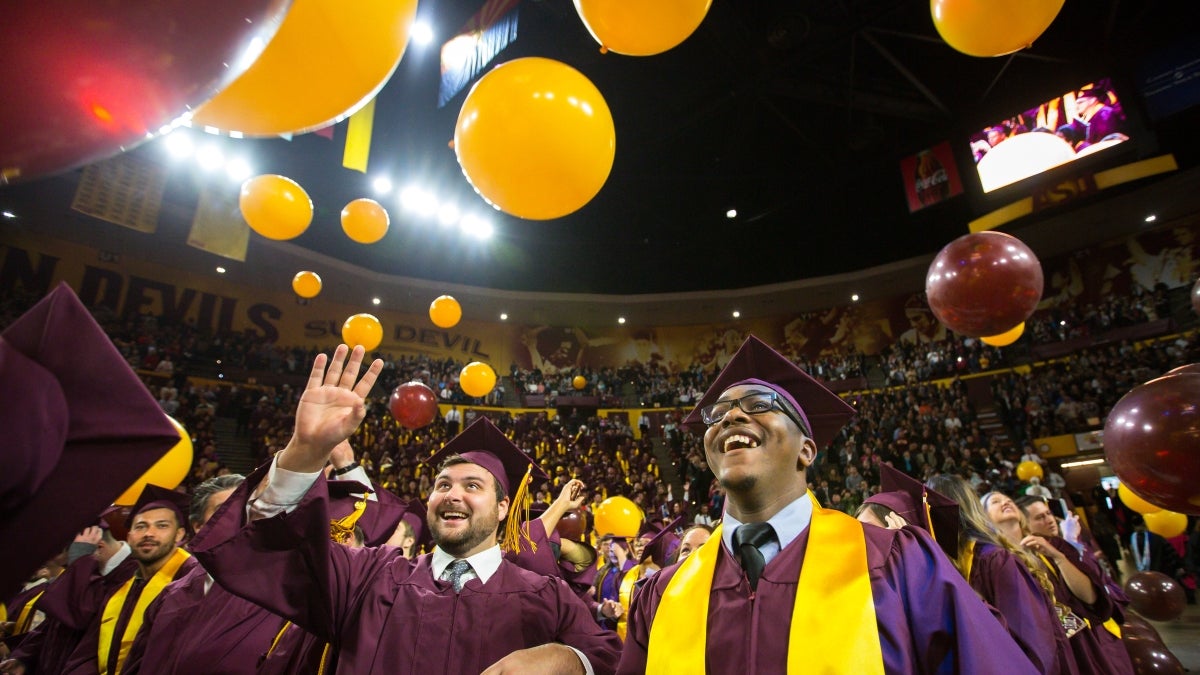 New graduates celebrate at the ASU undergraduate commencement.