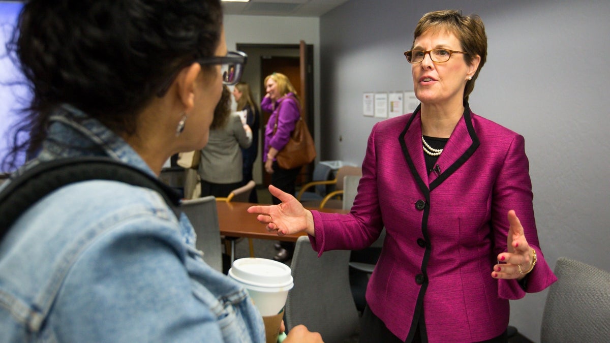 Woman speaking with her hands.