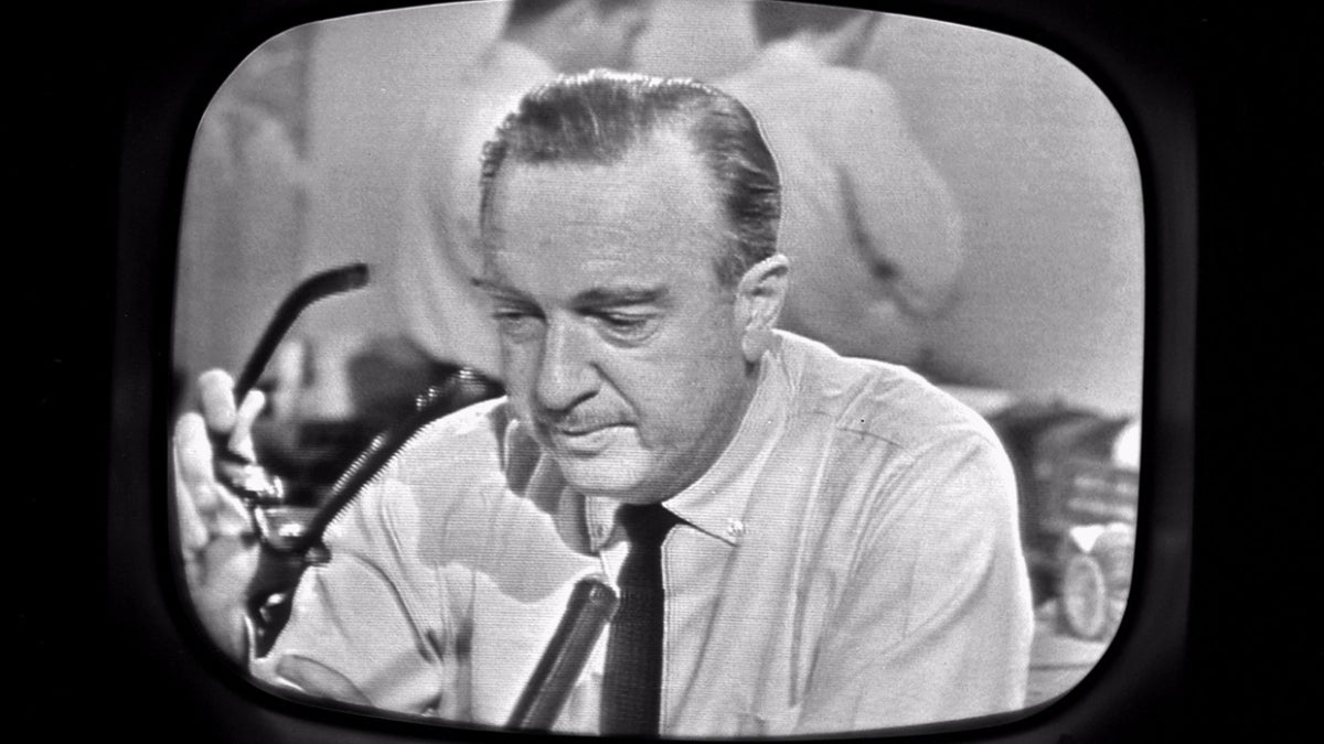 Walter Cronkite on television screen