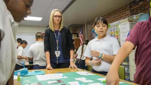 ASU graduate Lauren Edgar works with students